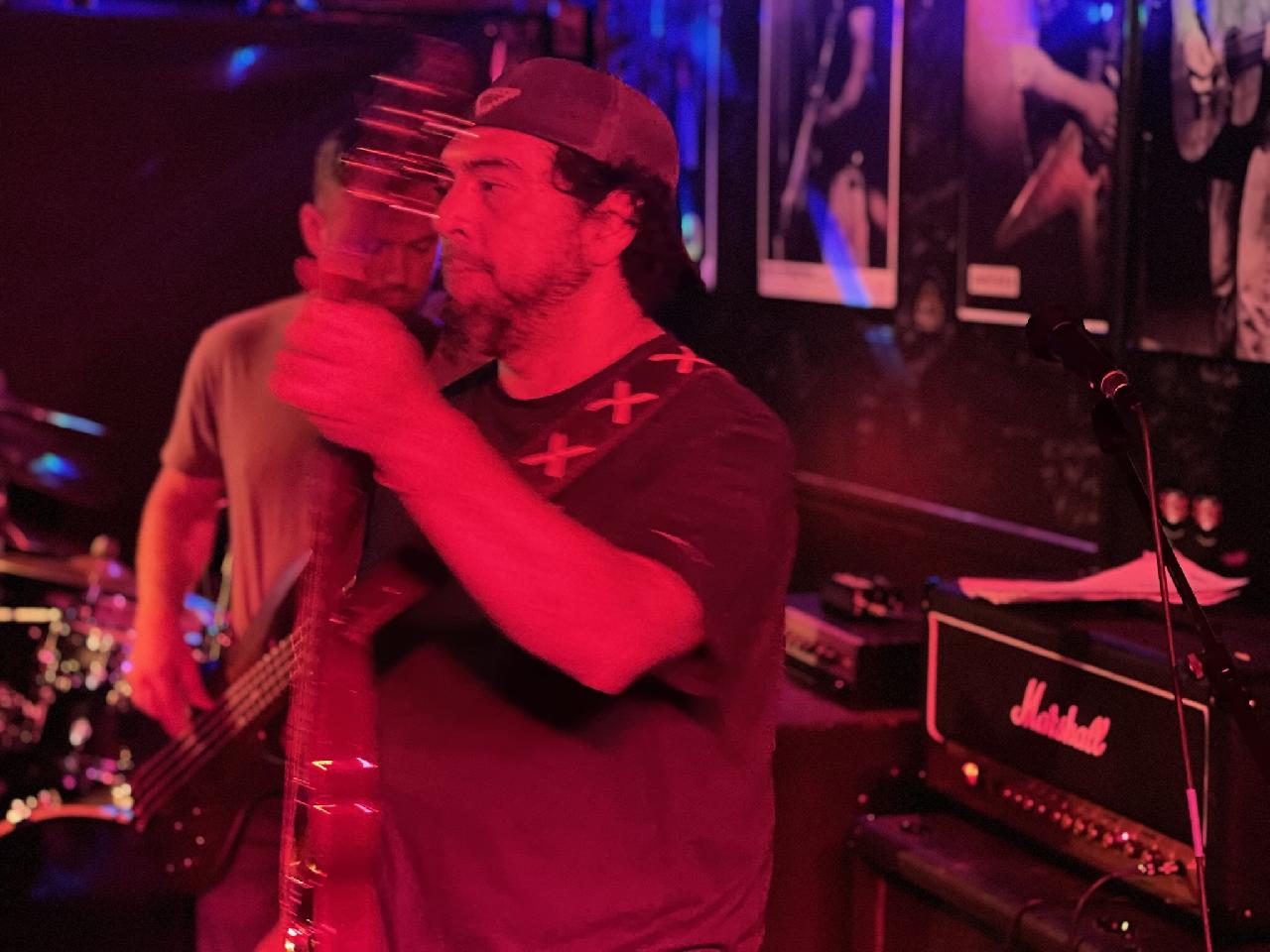 Guitarist locked in during a Piece of Me set